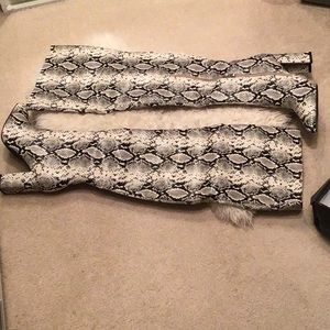 Thigh high snake print boots